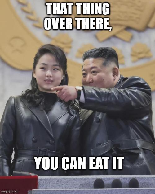 A North Korean adult teaching it's offspring about their feeding habbits.